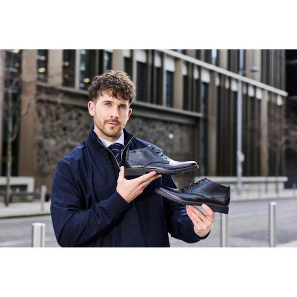 Rieker 13902-00 men's wide black leather zip & lace ankle boots, lifestyle view 1 of 4.
