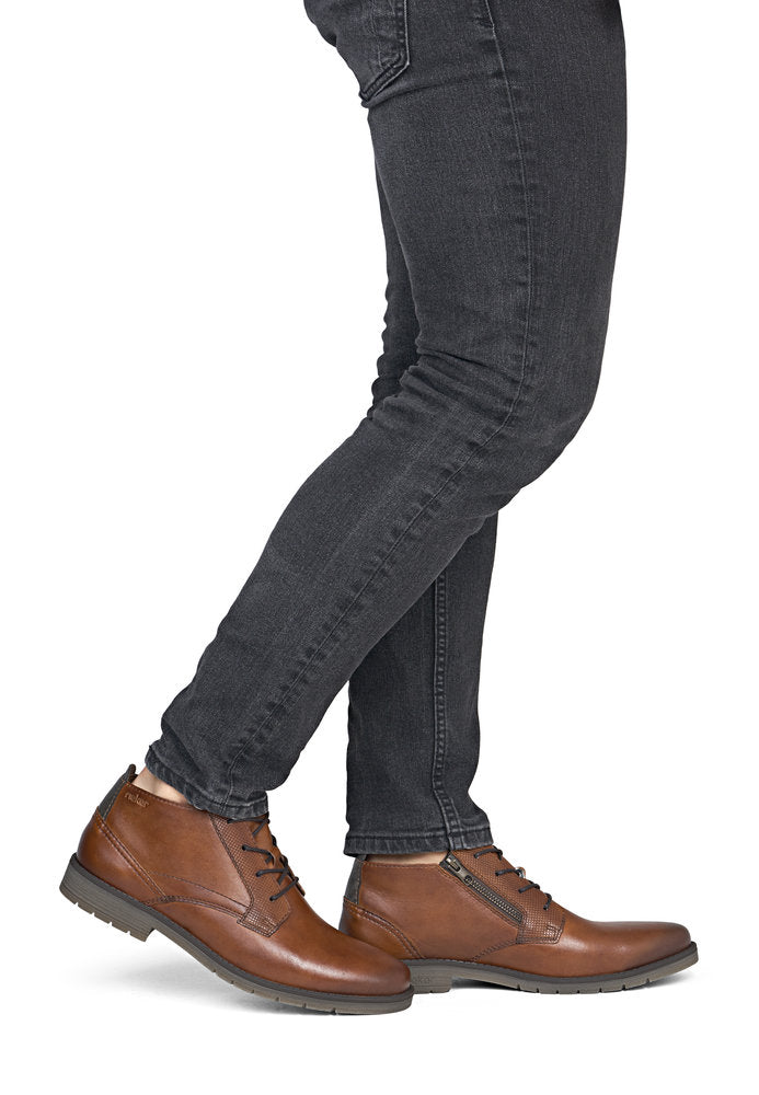 Rieker 13902-24 men's wide brown leather lace up ankle boots, on-foot lifestyle view.
