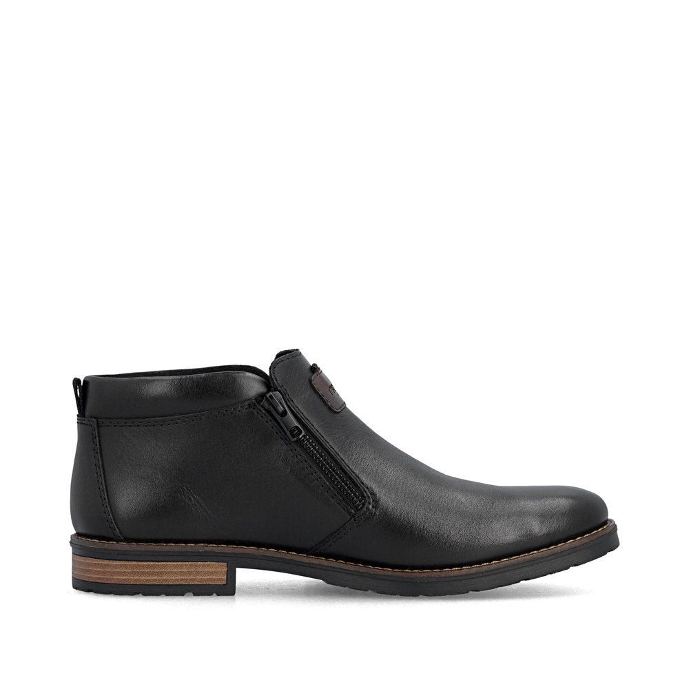 Rieker 14656-00 men's wide black leather water resistant side zip ankle boots, outer side view.