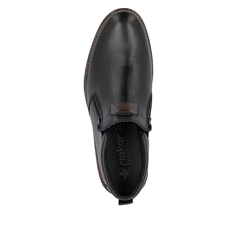 Rieker 14656-00 men's wide black leather water resistant side zip ankle boots, top view.
