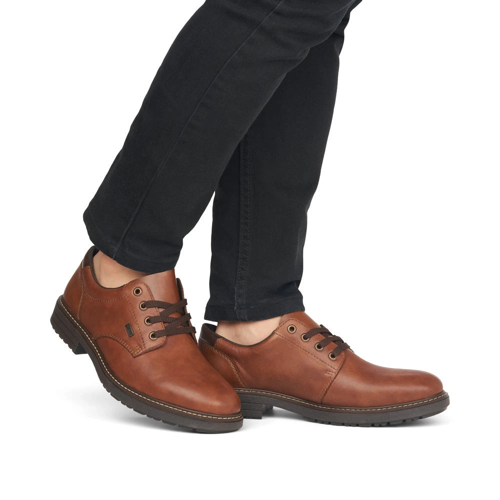 Rieker 33101-24 men's brown leather water resistant lace up shoes, on-foot lifestyle view.