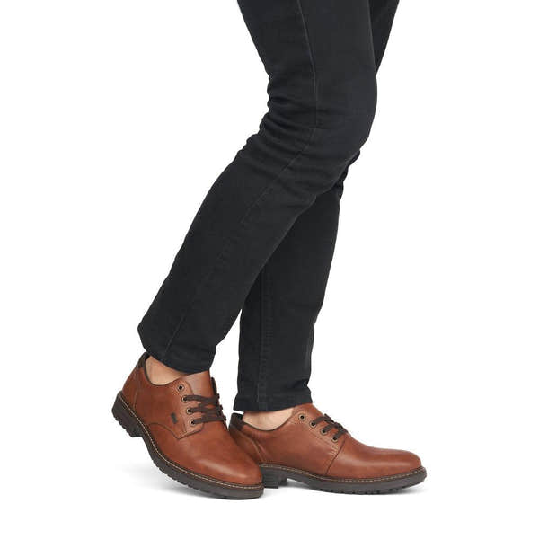 Rieker 33101-24 men's brown leather water resistant lace up shoes, on-foot lifestyle view.