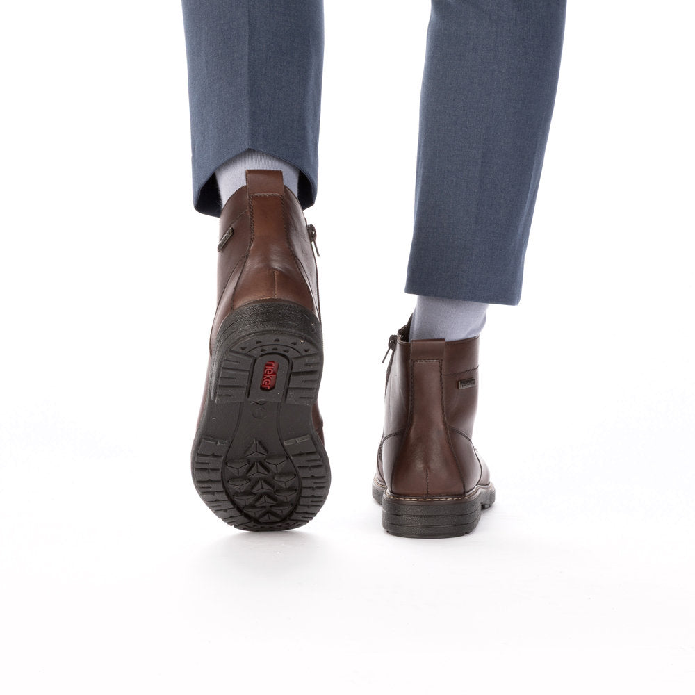 Rieker 33143-25 men's brown leather water resistant zip & lace ankle boots, lifestyle view 4 of 4.
