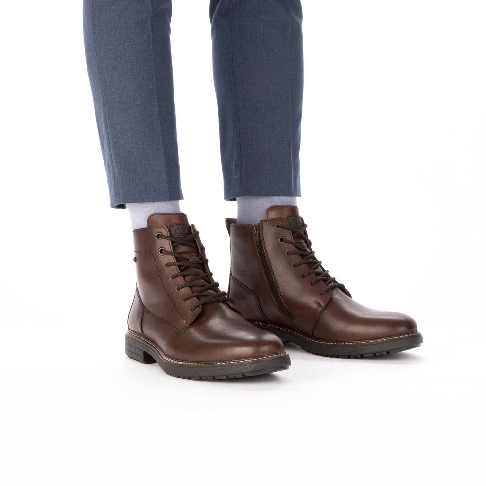 Rieker 33143-25 men's brown leather water resistant zip & lace ankle boots, on-foot lifestyle view.