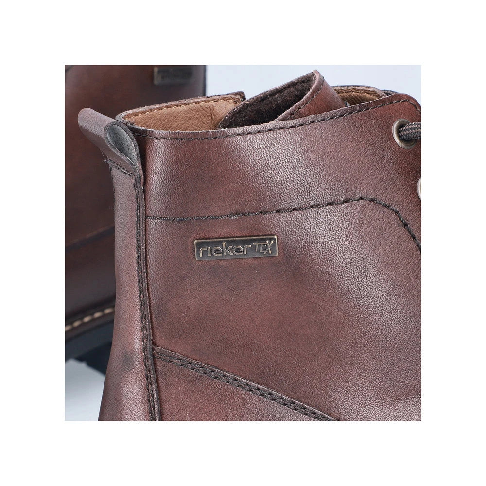 Rieker 33143-25 men's brown leather water resistant zip & lace ankle boots, lifestyle view.