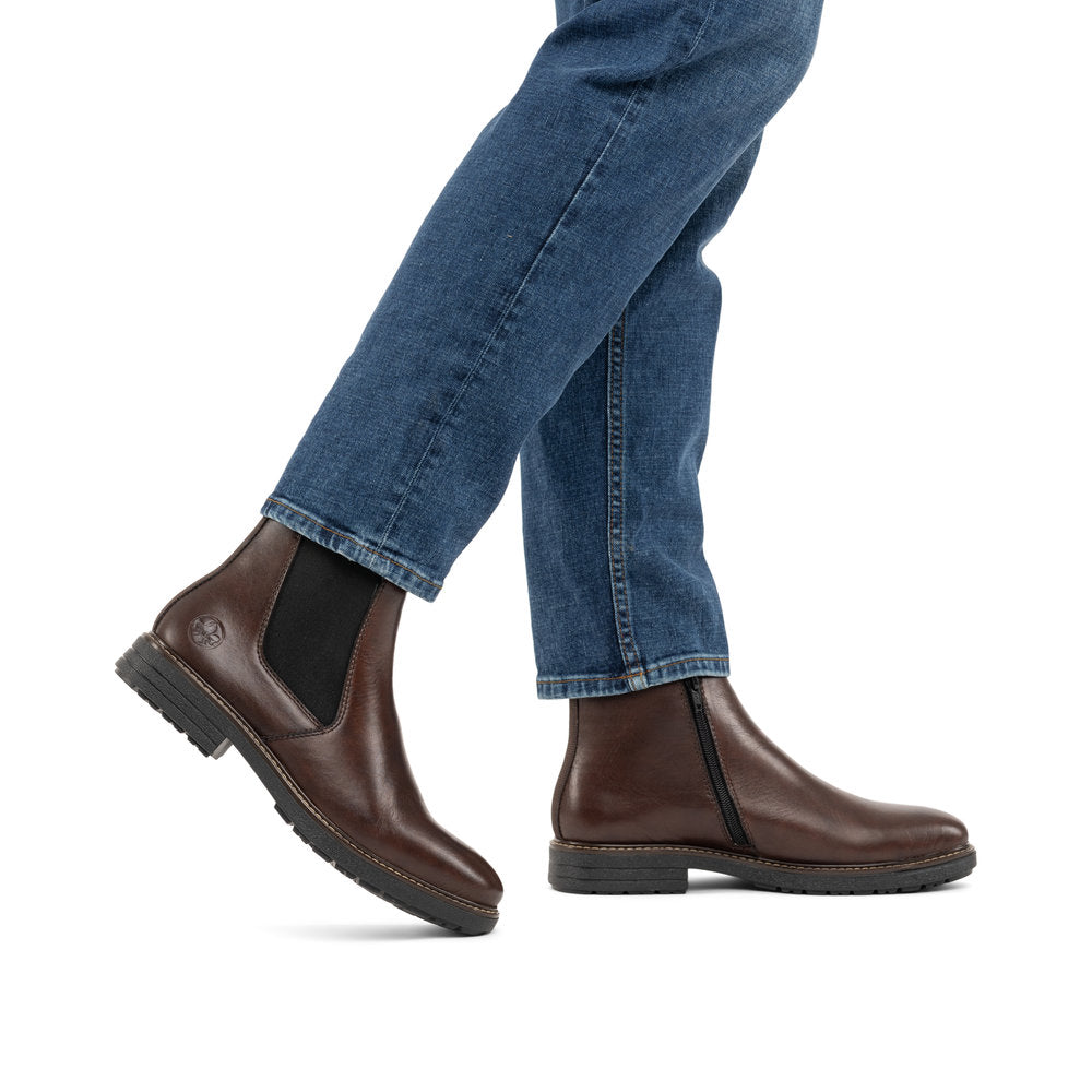 Rieker 33180-26 men's brown leather side zip ankle boots, lifestyle view 1 of 4.