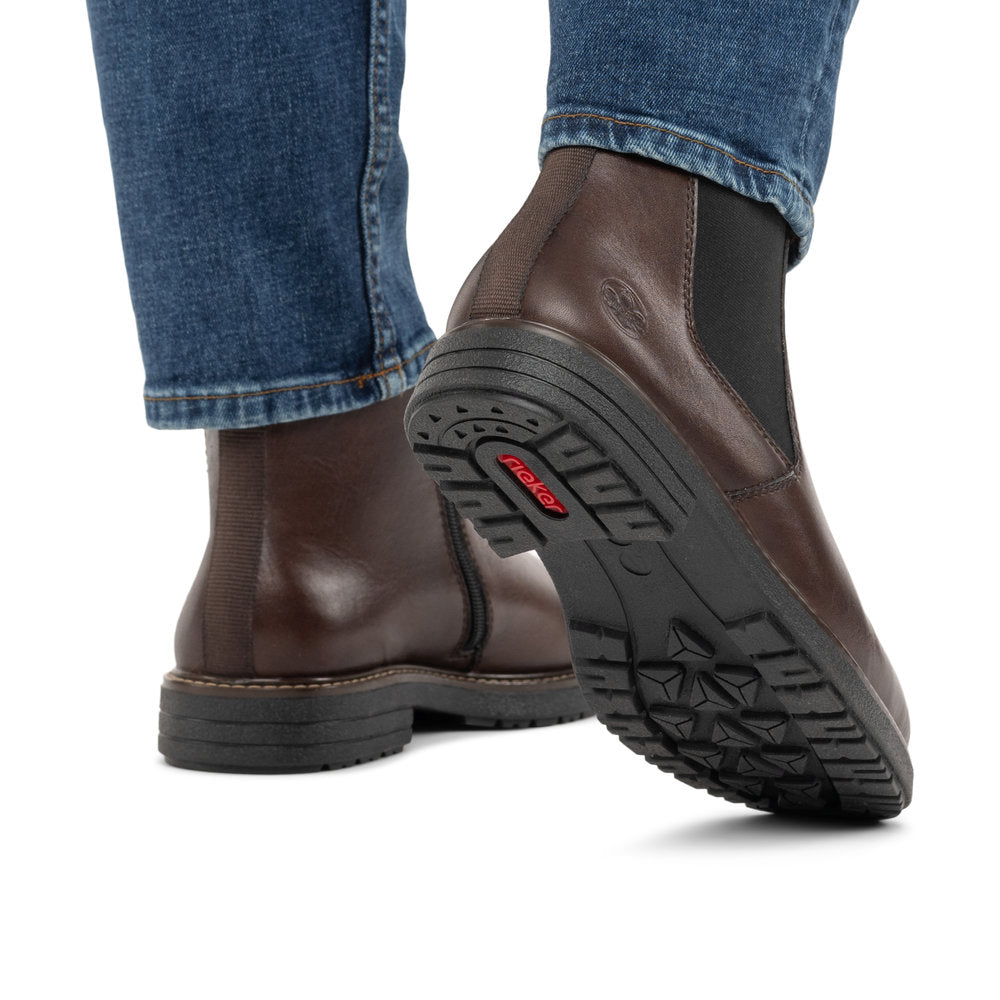 Rieker 33180-26 men's brown leather side zip ankle boots, lifestyle view 3 of 4.