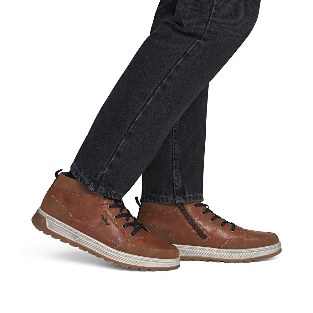 Rieker 37006-25 men's wide brown lace up ankle boots, on-foot lifestyle view.