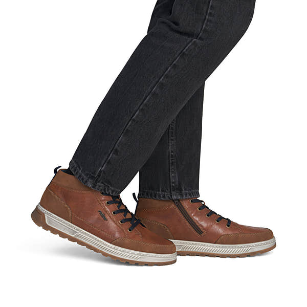 Rieker 37006-25 men's wide brown lace up ankle boots, on-foot lifestyle view.