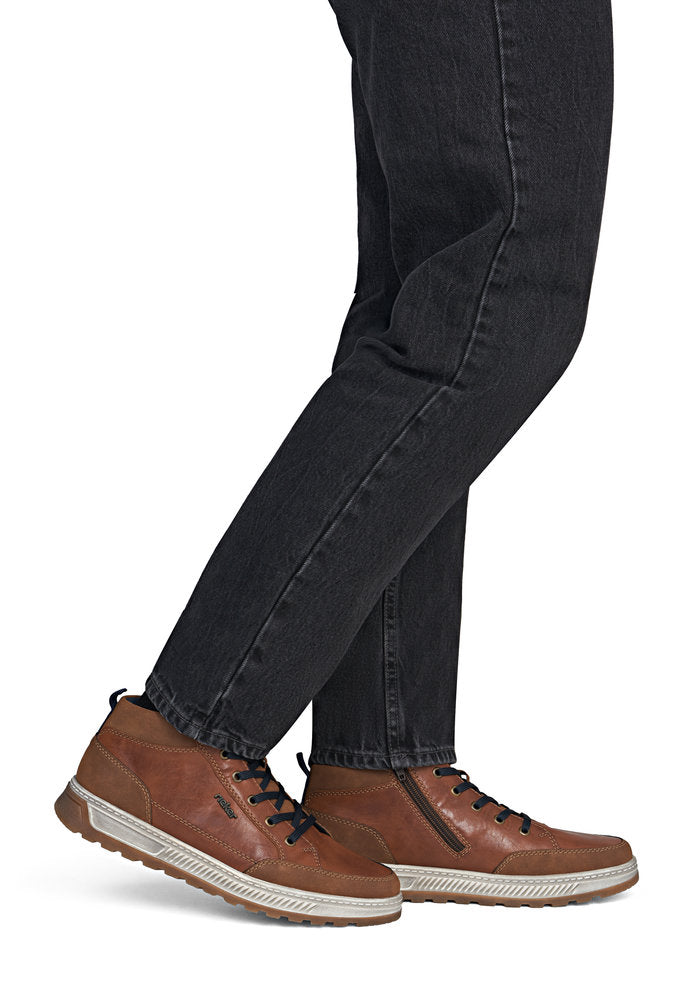Rieker 37006-25 men's wide brown lace up ankle boots, on-foot lifestyle view.