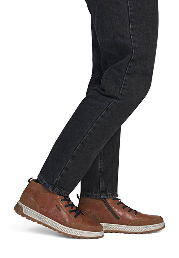 Rieker 37006-25 men's wide brown lace up ankle boots, on-foot lifestyle view.