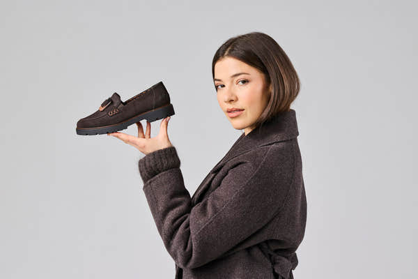 Rieker 45553-25 women's dark brown elasticated shoes, lifestyle view 2 of 27.
