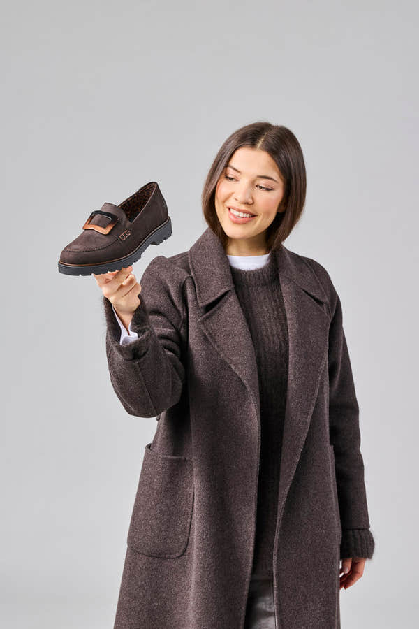 Rieker 45553-25 women's dark brown elasticated shoes, lifestyle view 3 of 27.