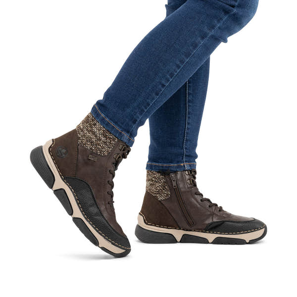 Rieker 45956-25 women's multi water resistant zip & lace ankle boots, lifestyle view 1 of 15.