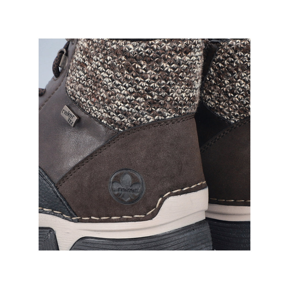 Rieker 45956-25 women's multi water resistant zip & lace ankle boots, lifestyle view.
