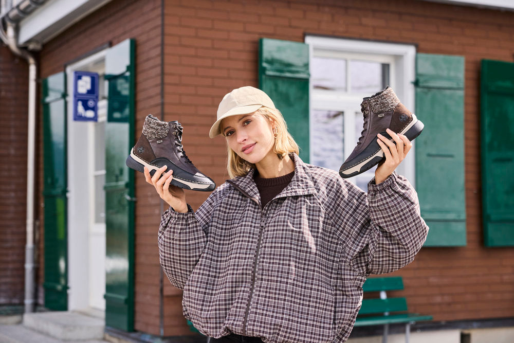 Rieker 45956-25 women's multi water resistant zip & lace ankle boots, lifestyle view 1 of 11.