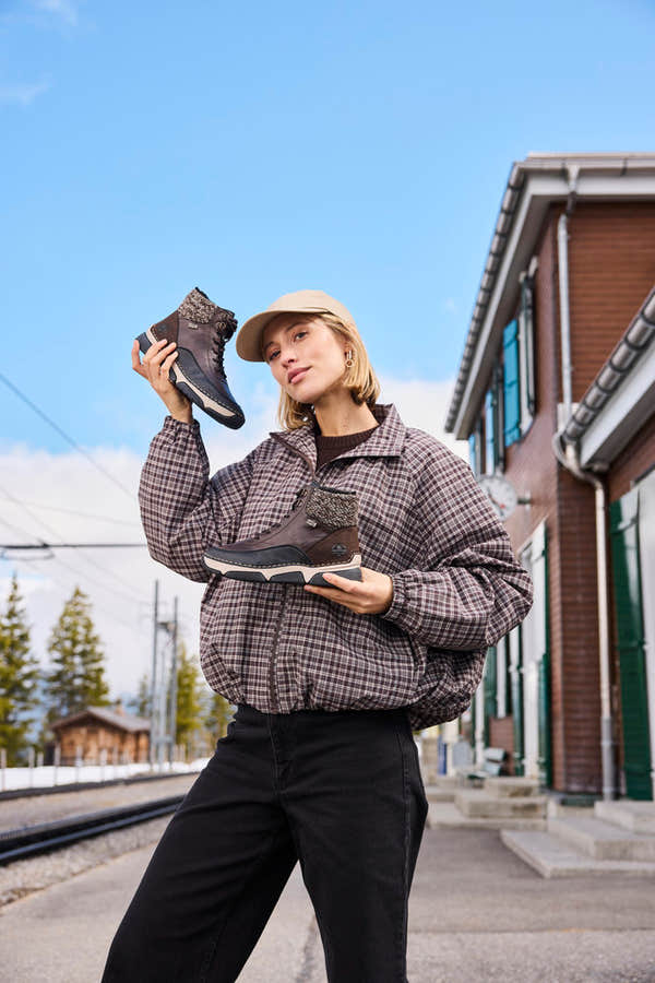 Rieker 45956-25 women's multi water resistant zip & lace ankle boots, lifestyle view 3 of 11.