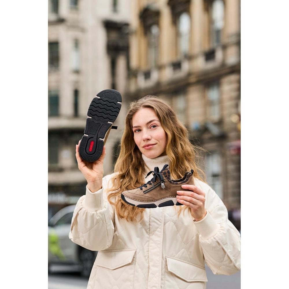 Rieker 45973-24 women's brown elasticated shoes, lifestyle view 9 of 30.