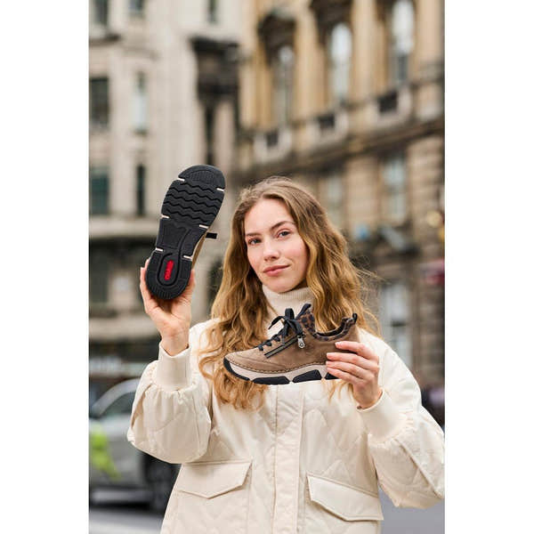 Rieker 45973-24 women's brown elasticated shoes, lifestyle view 9 of 30.
