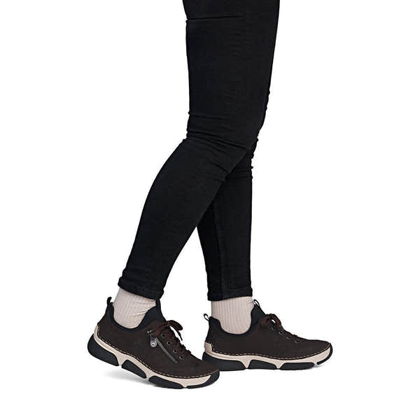 Rieker 45973-25 women's black elasticated shoes, on-foot lifestyle view.