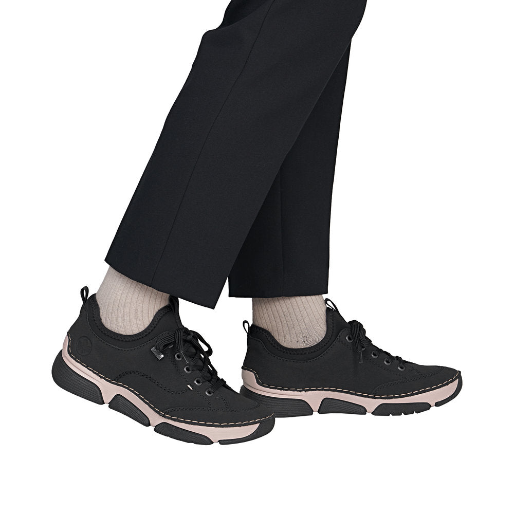 Rieker 45976-00 women's black suede water resistant elasticated shoes, on-foot lifestyle view.