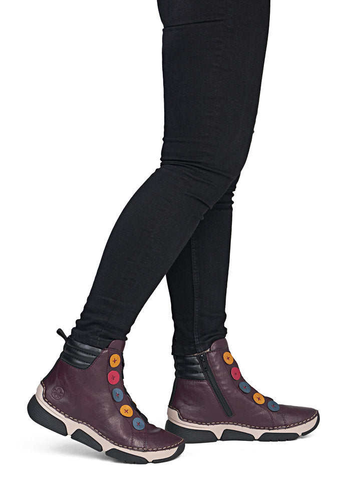 Rieker 45977-30 women's multi zip & lace ankle boots, on-foot lifestyle view.