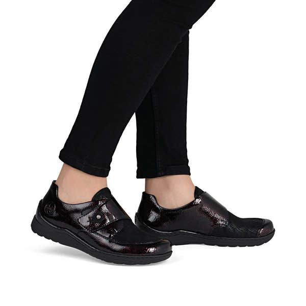 Rieker 48951-35 women's red touch fastening shoes, on-foot lifestyle view.