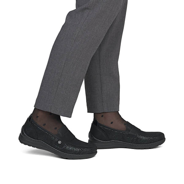 Rieker 48968-00 women's wide black elasticated shoes, on-foot lifestyle view.