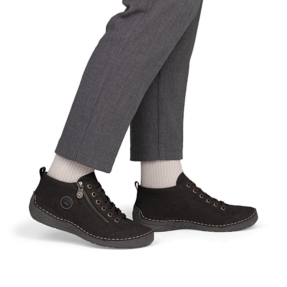 Rieker 52514-26 women's brown zip & lace shoes, on-foot lifestyle view.
