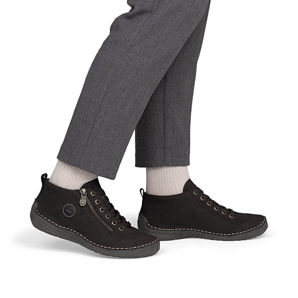 Rieker 52514-26 women's brown zip & lace shoes, on-foot lifestyle view.