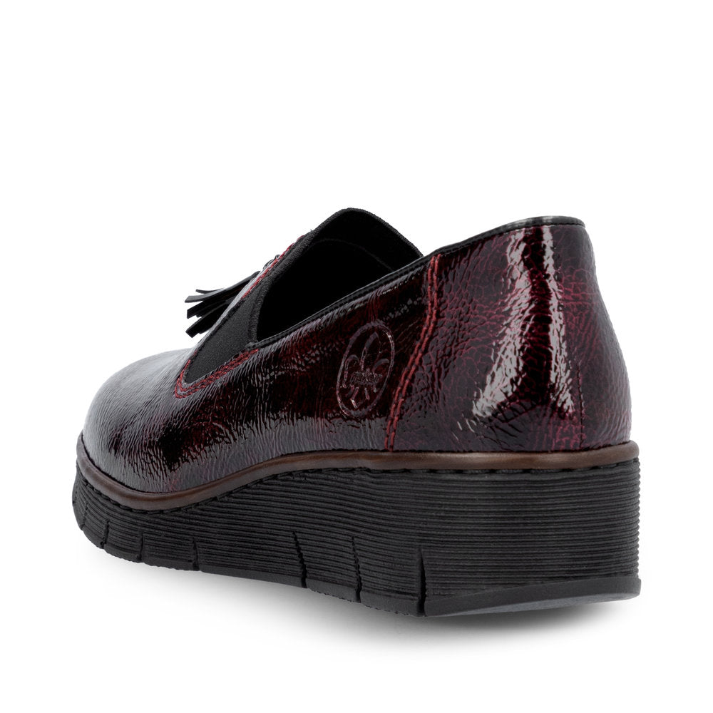 Rieker 53751-35 Burgundy Patent Slip on Shoe, rear three-quarter view.