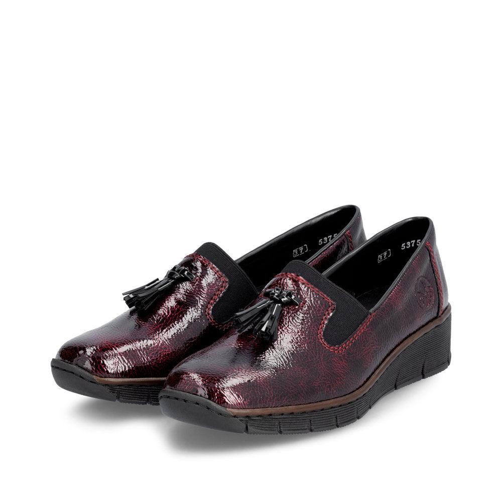 Rieker 53751-35 Burgundy Patent Slip on Shoe, paired three-quarter view.
