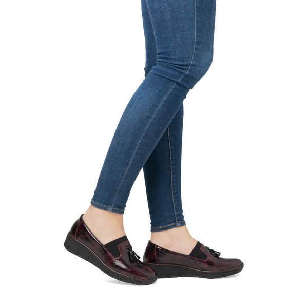 Rieker 53751-35 Burgundy Patent Slip on Shoe, on-foot lifestyle view.