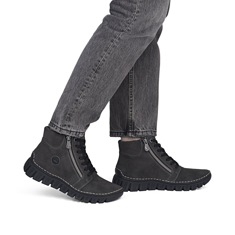 Rieker 57502-45 women's grey zip & lace mid-calf boots, on-foot lifestyle view.