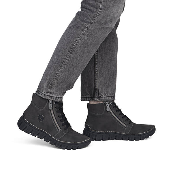 Rieker 57502-45 women's grey zip & lace mid-calf boots, on-foot lifestyle view.