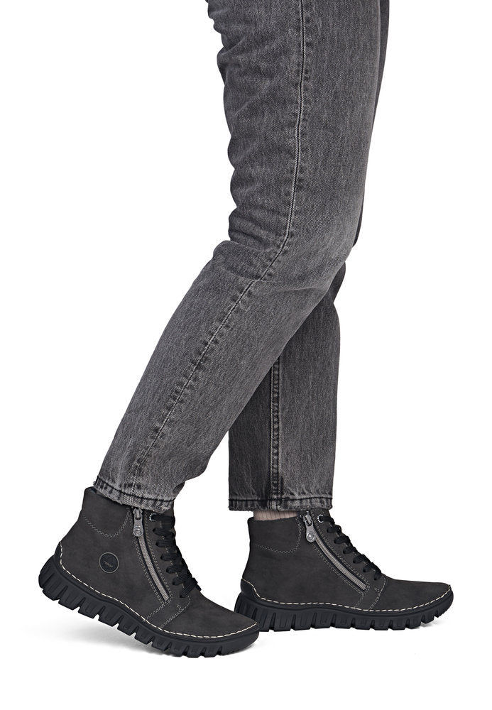 Rieker 57502-45 women's grey zip & lace mid-calf boots, on-foot lifestyle view.