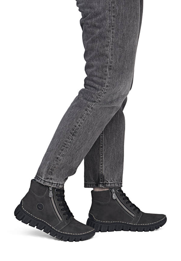 Rieker 57502-45 women's grey zip & lace mid-calf boots, on-foot lifestyle view.