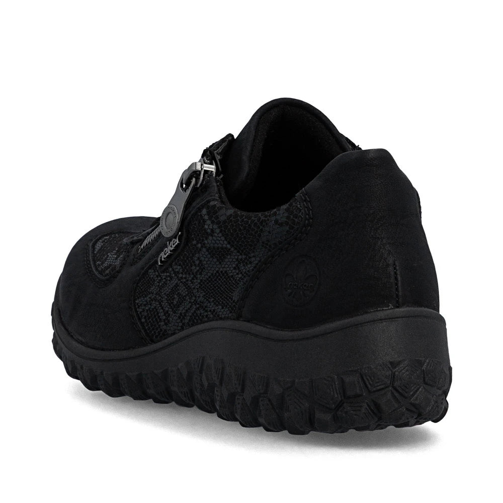 Rieker 59501-00 women's black zip & lace trainers, rear three-quarter view.