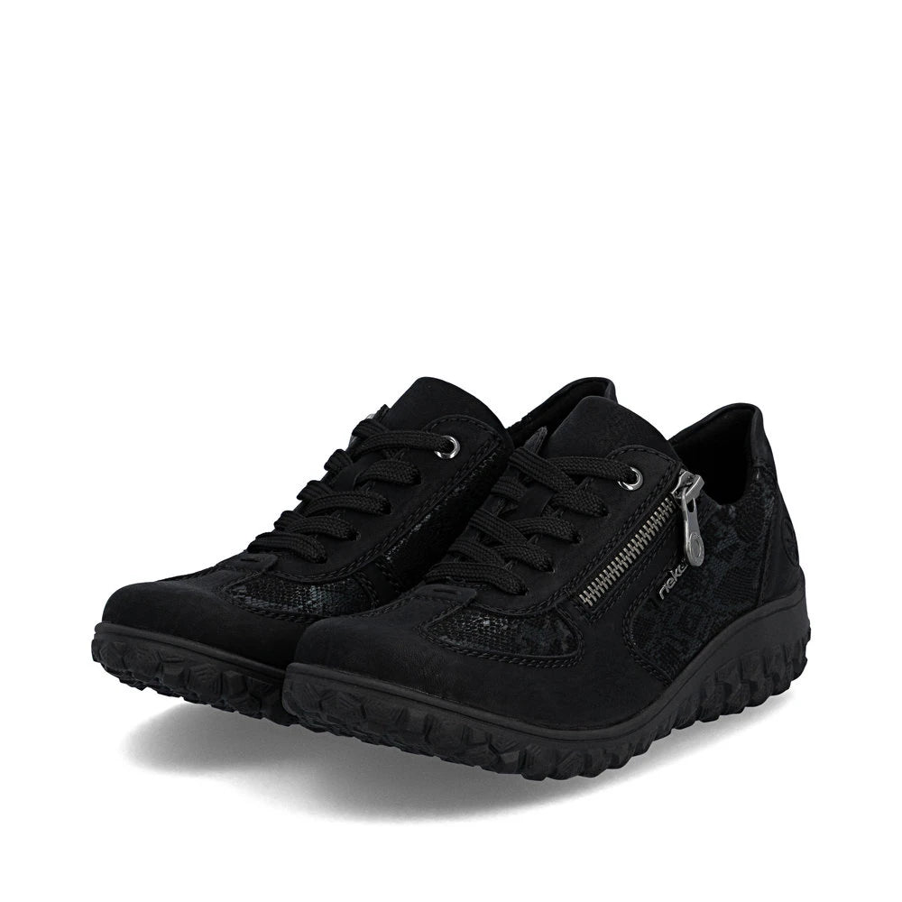 Rieker 59501-00 women's black zip & lace trainers, paired three-quarter view.