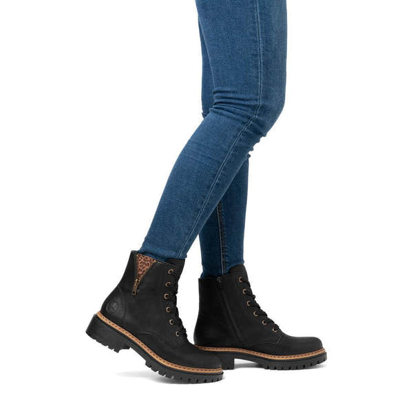 Rieker 72617-00 women's black zip & lace ankle boots, on-foot lifestyle view.