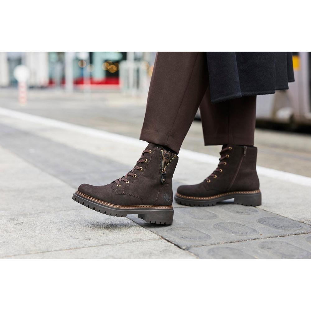 Rieker 72617-25 women's brown zip & lace ankle boots, lifestyle view 1 of 10.