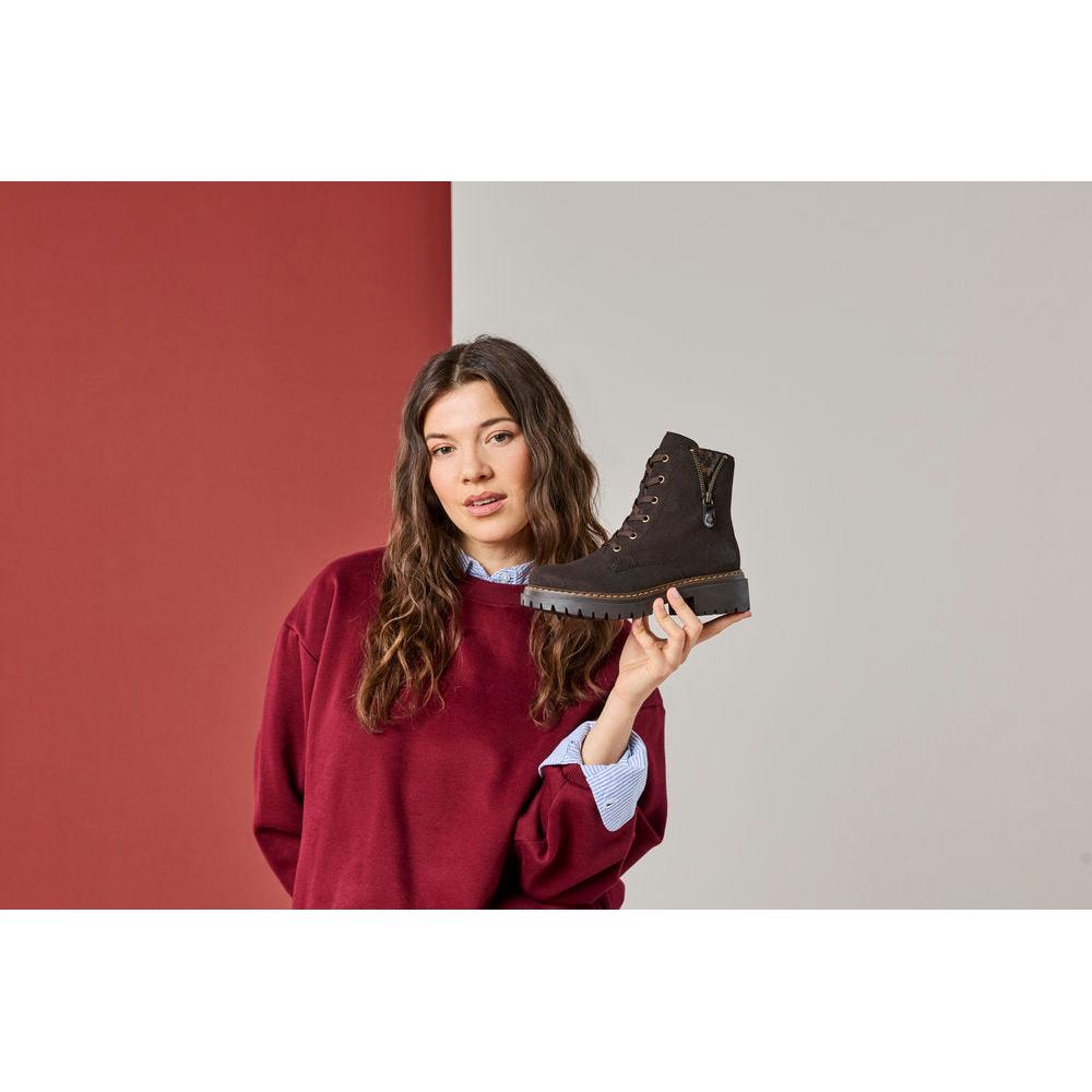 Rieker 72617-25 women's brown zip & lace ankle boots, lifestyle view 2 of 10.