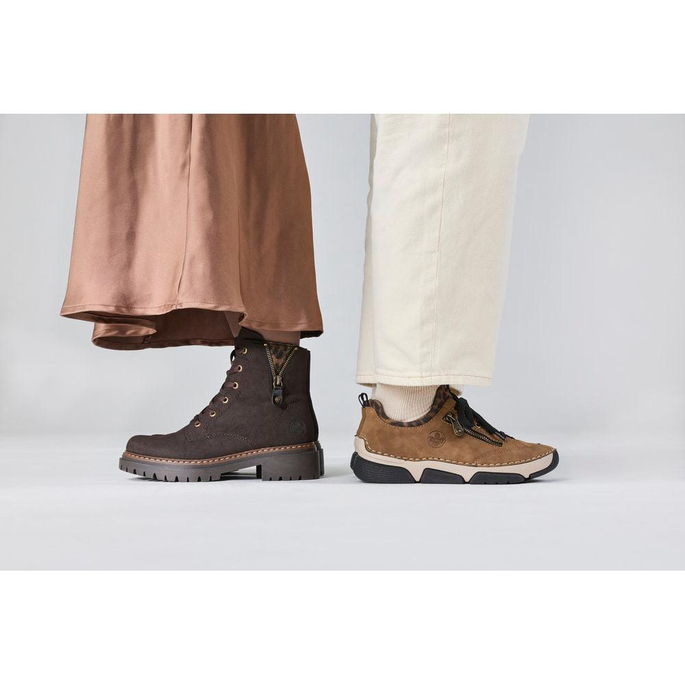 Rieker 72617-25 women's brown zip & lace ankle boots, lifestyle view 8 of 10.