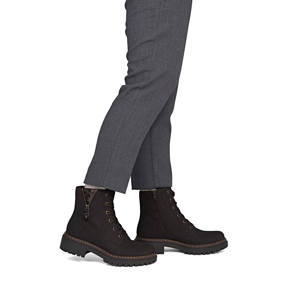 Rieker 72617-25 women's brown zip & lace ankle boots, on-foot lifestyle view.