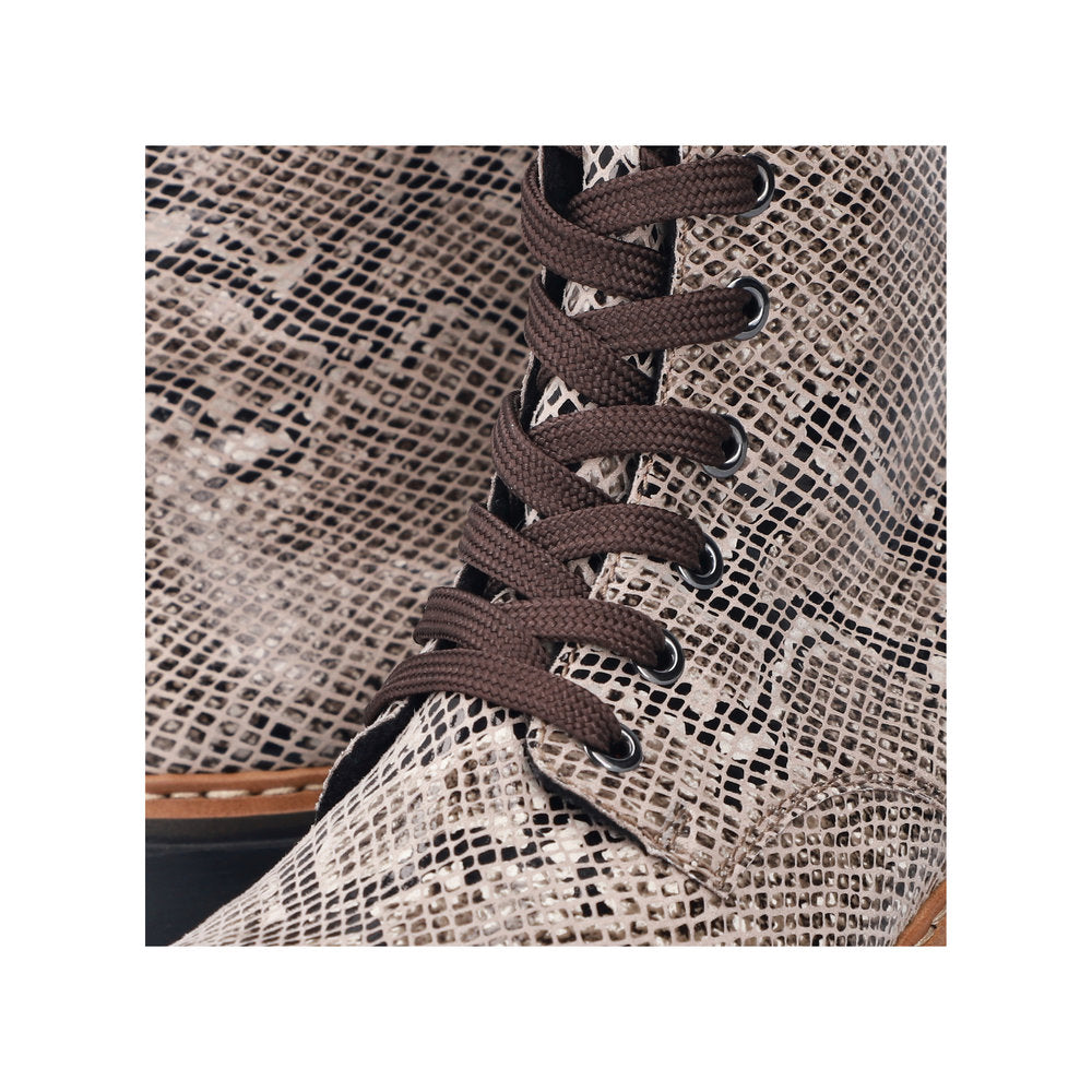 Rieker 72627-64 women's beige/black vegan zip & lace ankle boots, lifestyle view.