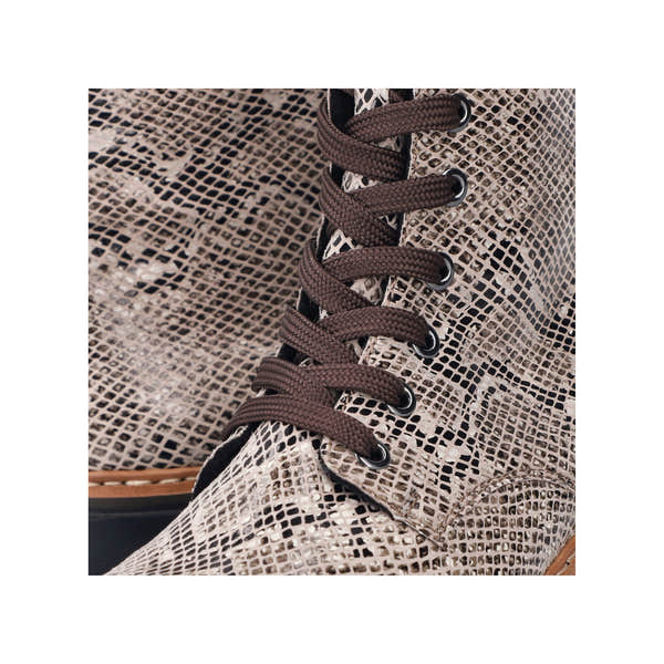 Rieker 72627-64 women's beige/black vegan zip & lace ankle boots, lifestyle view.
