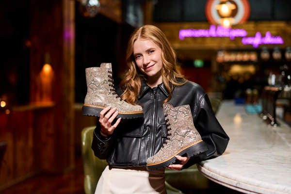 Rieker 72627-64 women's beige/black vegan zip & lace ankle boots, lifestyle view 1 of 6.