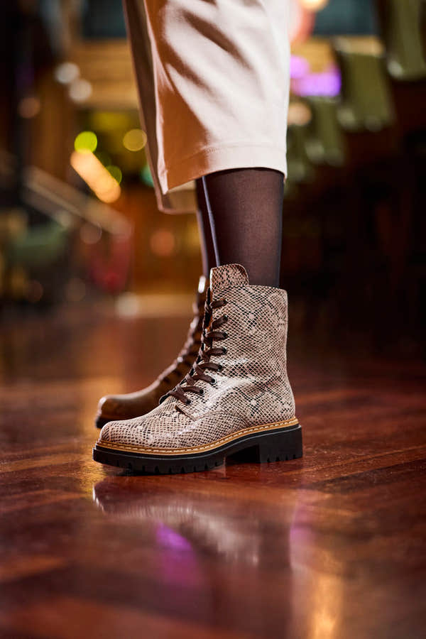 Rieker 72627-64 women's beige/black vegan zip & lace ankle boots, lifestyle view 5 of 6.