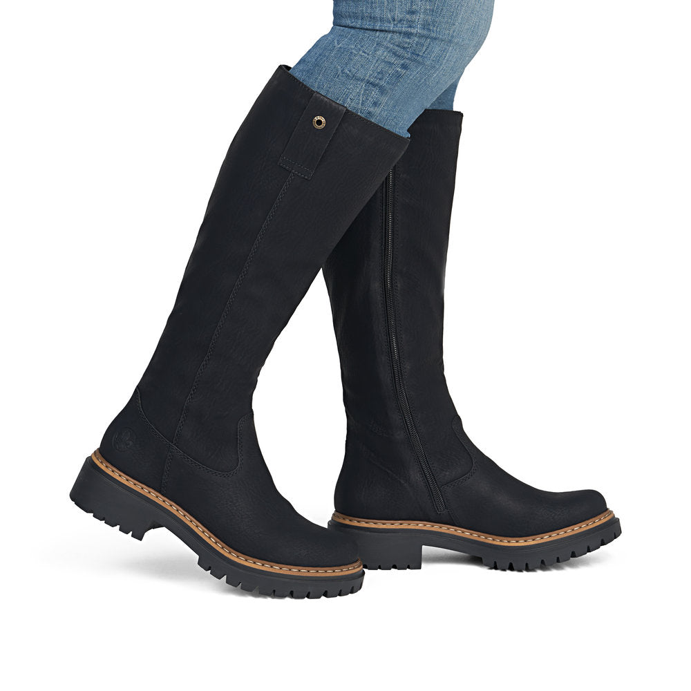 Rieker 72656-00 women's black side zip knee high boots, on-foot lifestyle view.