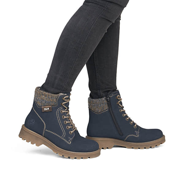 Rieker 73220-14 women's navy/grey water resistant zip & lace ankle boots, on-foot lifestyle view.
